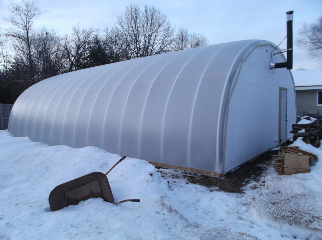 https://shrinkwrapcontainments.com/product_images/uploaded_images/air-inflated-wind-resistant-greenhouse-winter-1024x764.jpg